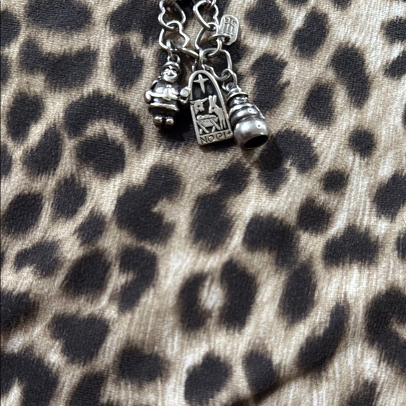 James Avery charms retired on good used condition, the charms have cut loop.